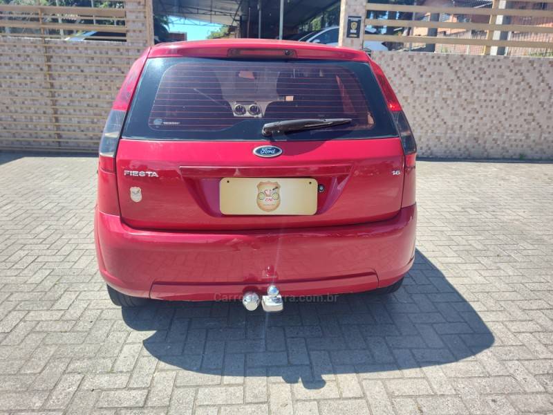 FORD - FIESTA - 2012/2013 - Vermelha - R$ 31.900,00