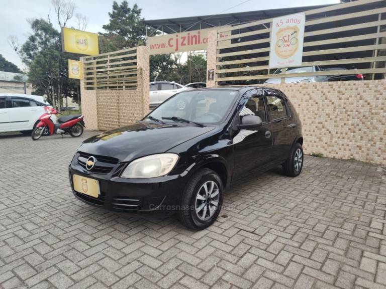 CHEVROLET - CELTA - 2009/2010 - Preta - R$ 24.900,00