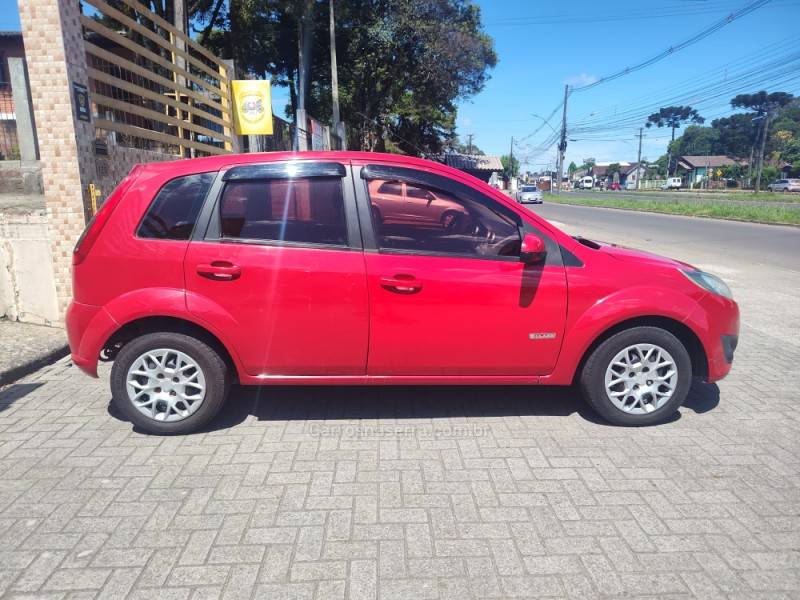 FORD - FIESTA - 2012/2013 - Vermelha - R$ 31.900,00