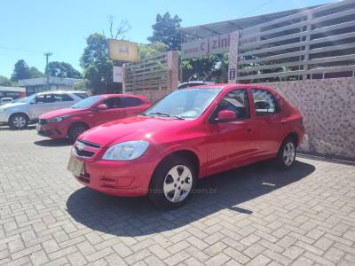 CHEVROLET - PRISMA - 2011/2012 - Vermelha - R$ 29.900,00