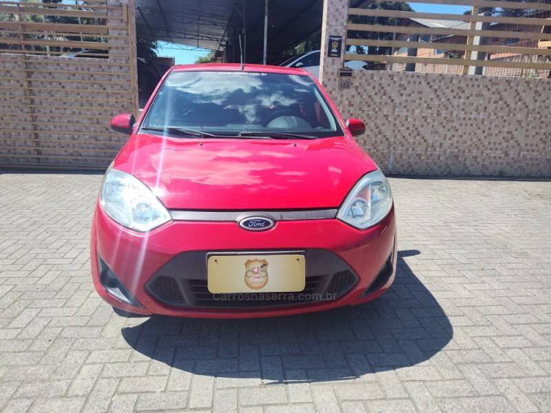 FORD - FIESTA - 2012/2013 - Vermelha - R$ 31.900,00