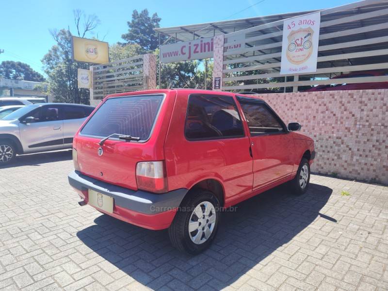 FIAT - UNO - 2009/2010 - Vermelha - R$ 19.900,00