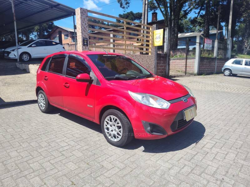 FORD - FIESTA - 2012/2013 - Vermelha - R$ 31.900,00