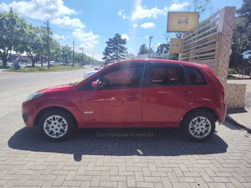 FORD - FIESTA - 2012/2013 - Vermelha - R$ 31.900,00